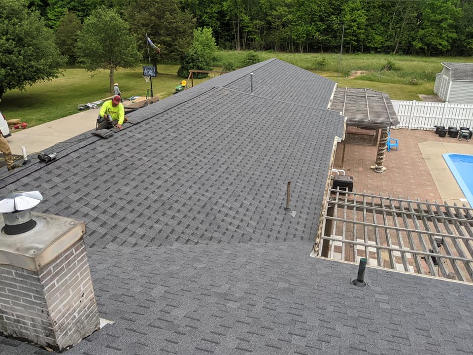 roofing contractor finishing up inspection