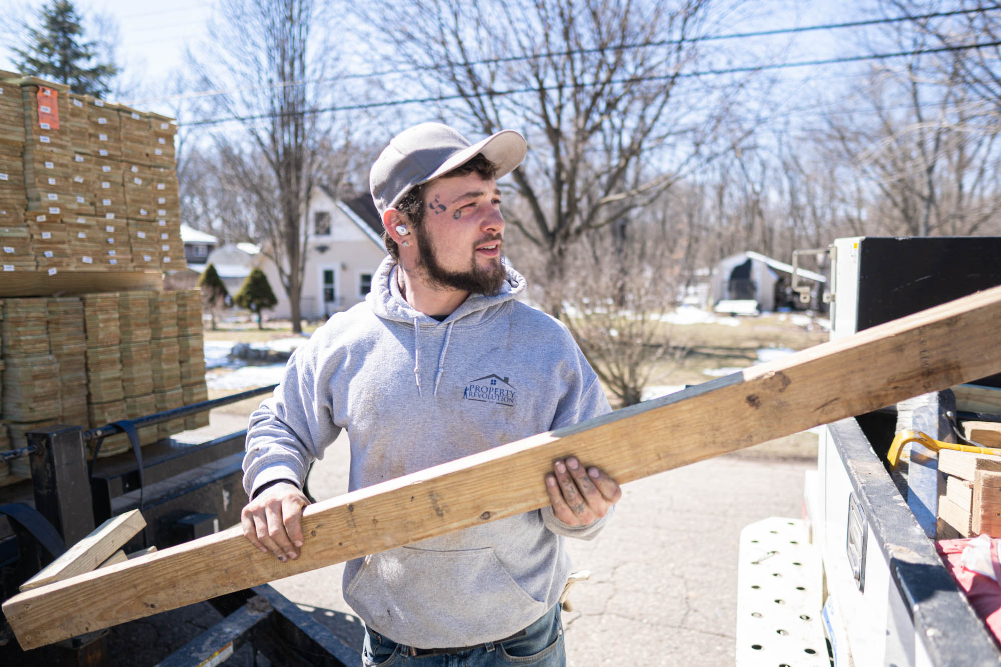 Property Revolution Worker With Board