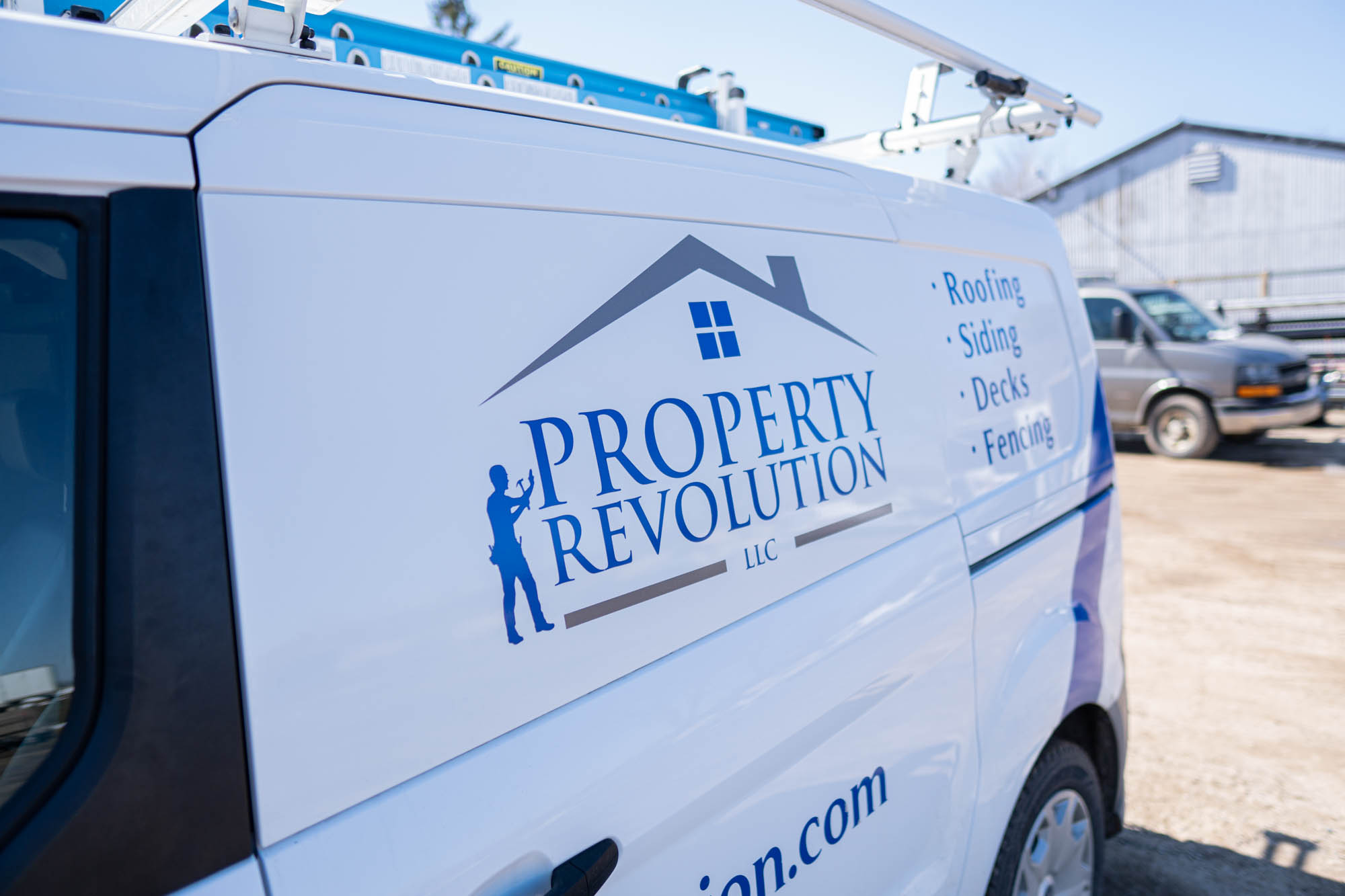 Logo on Property Revolution Vehicle Kalamazoo, MI