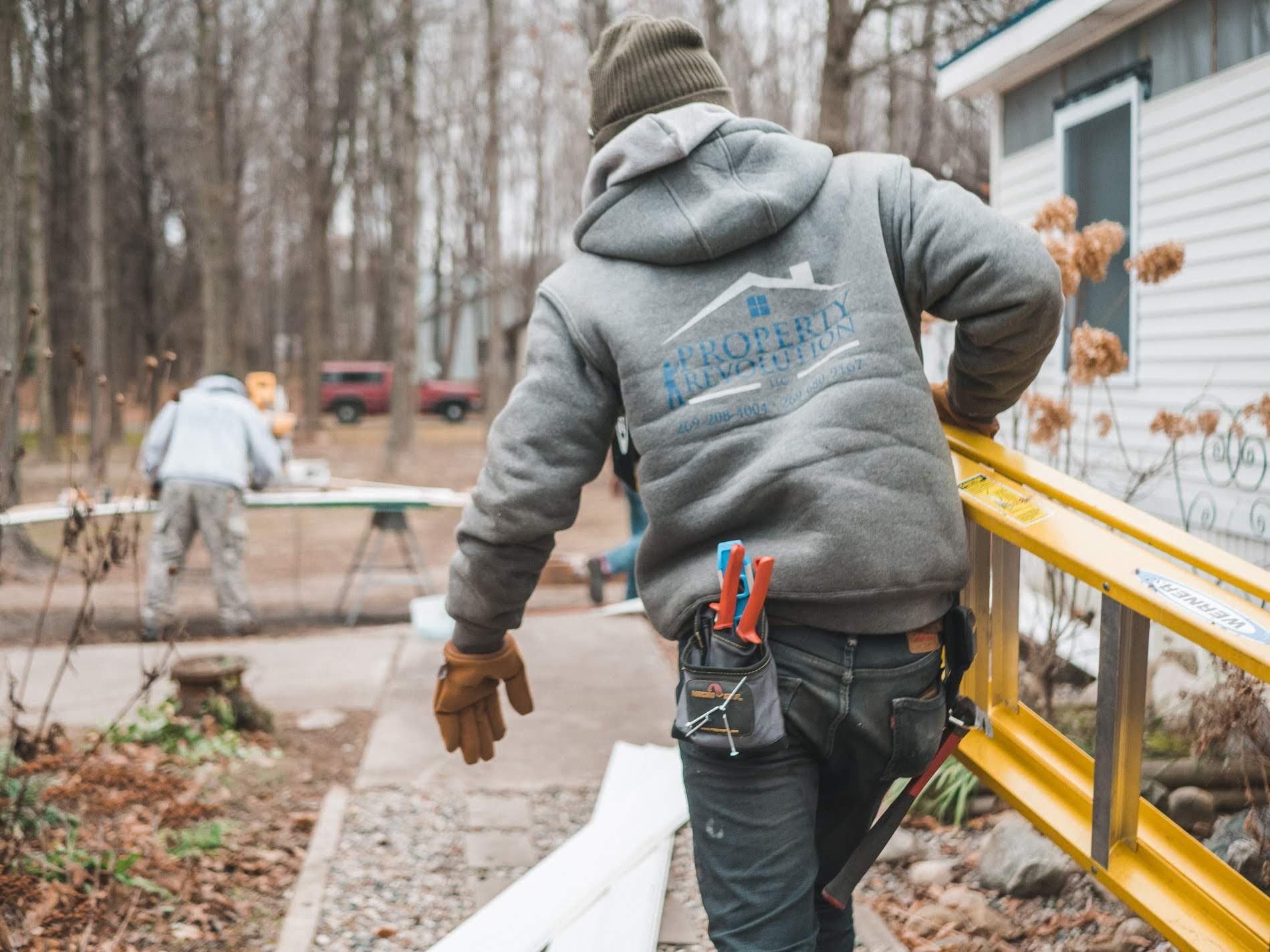 Property Revolution Crew With Ladder on Jobsite