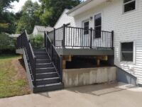 Property Revolution 22 Composite deck on front porch