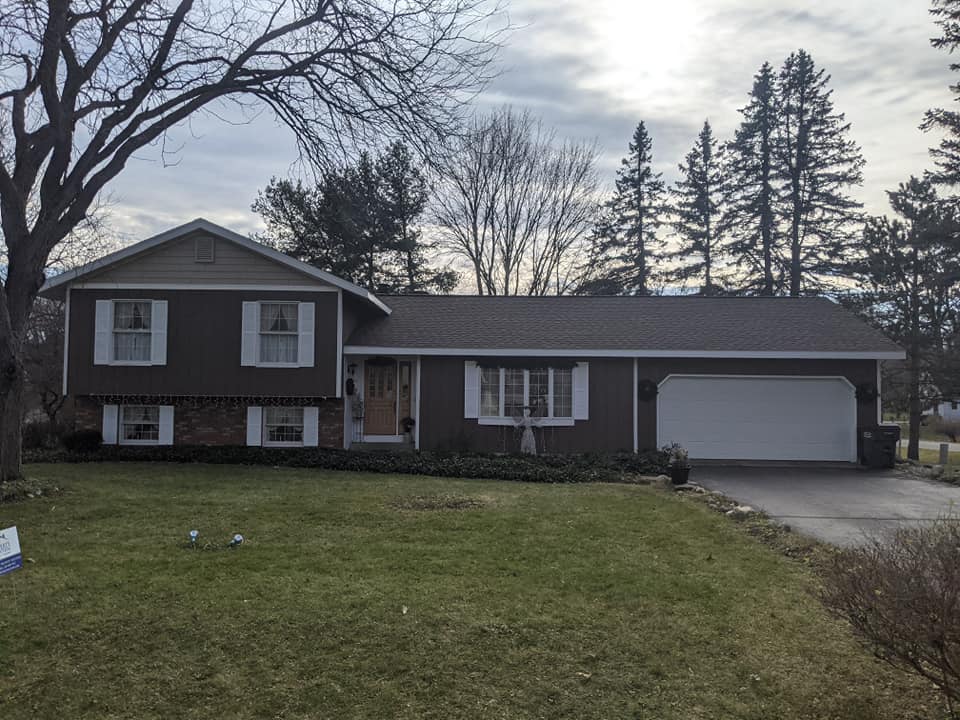 brown roof on single story home in kalamazoo