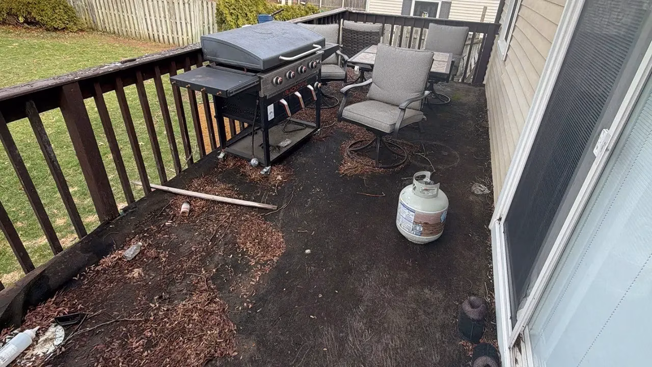 Unsafe, Weather-Damaged Deck Replacement in Kalamazoo, MI 03 Deteriorated wood deck and unsafe rotting stairs in Kalamazoo MI before replacement