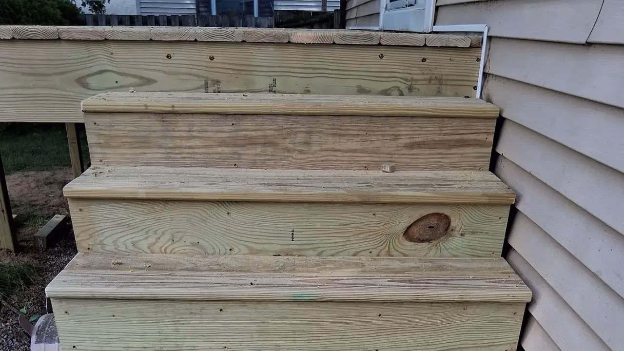 Unsafe, Weather-Damaged Deck Replacement in Kalamazoo, MI 05 Completed custom wood deck replacement in Kalamazoo MI by Property Revolution